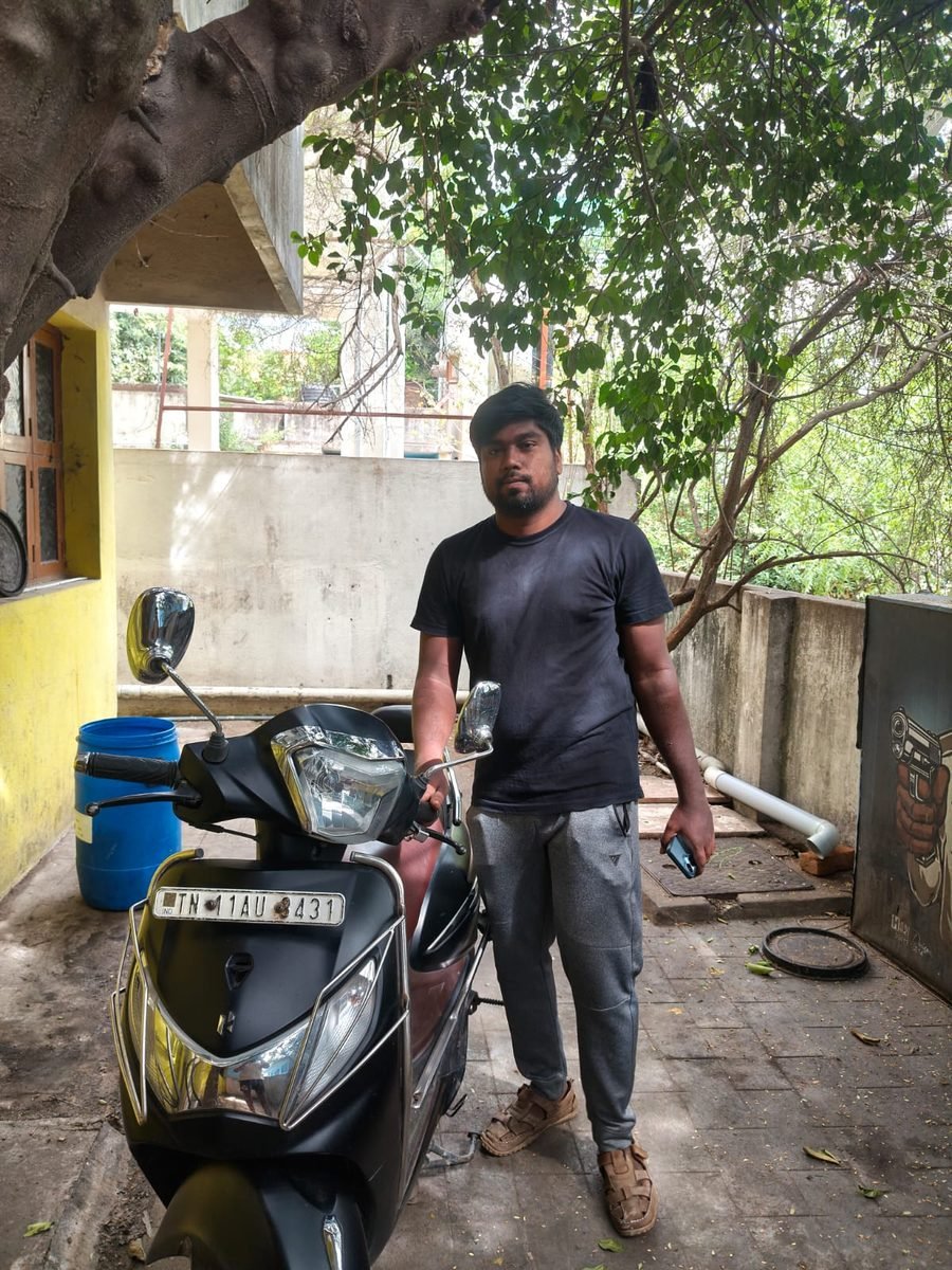 Velan Enterprises customer with rented scooter